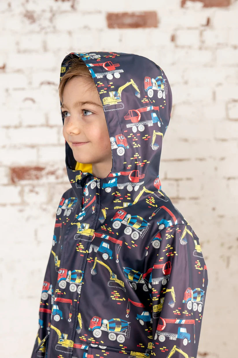 Side image of a boy wearing the coat with the hood up  