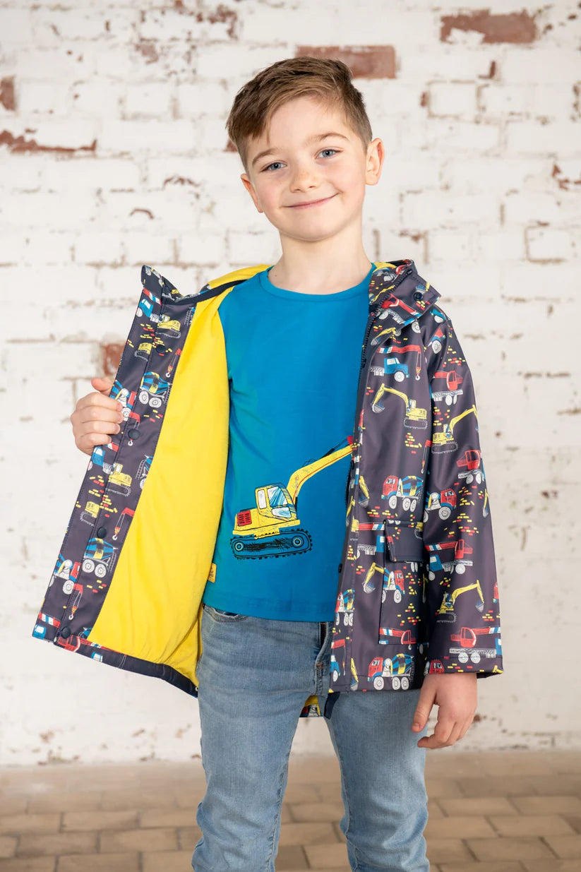 image of boy wearing the coat open showing the yellow lining 