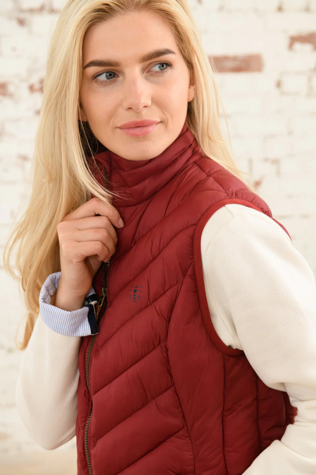 maroon red lighthouse womens padded gilet 
