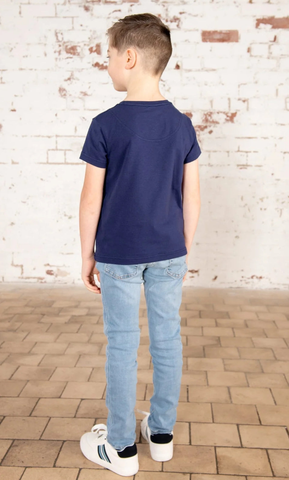 Lighthouse kids Oliver short sleeve t-shirt in navy with dinosaur print.