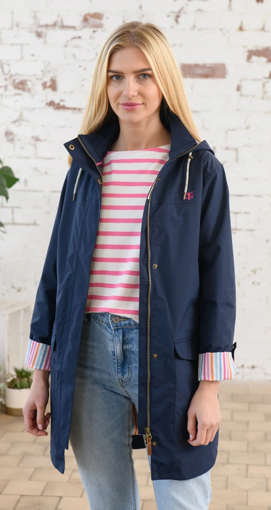 Navy women's waterproof Rebecca raincoat from Lighthouse.