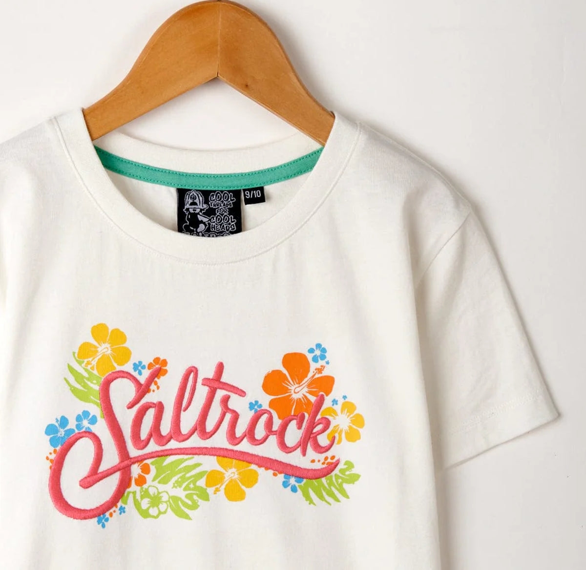 Short sleeve kids tee from Saltrock in White with a multicoloured tropical floral logo print on the front.